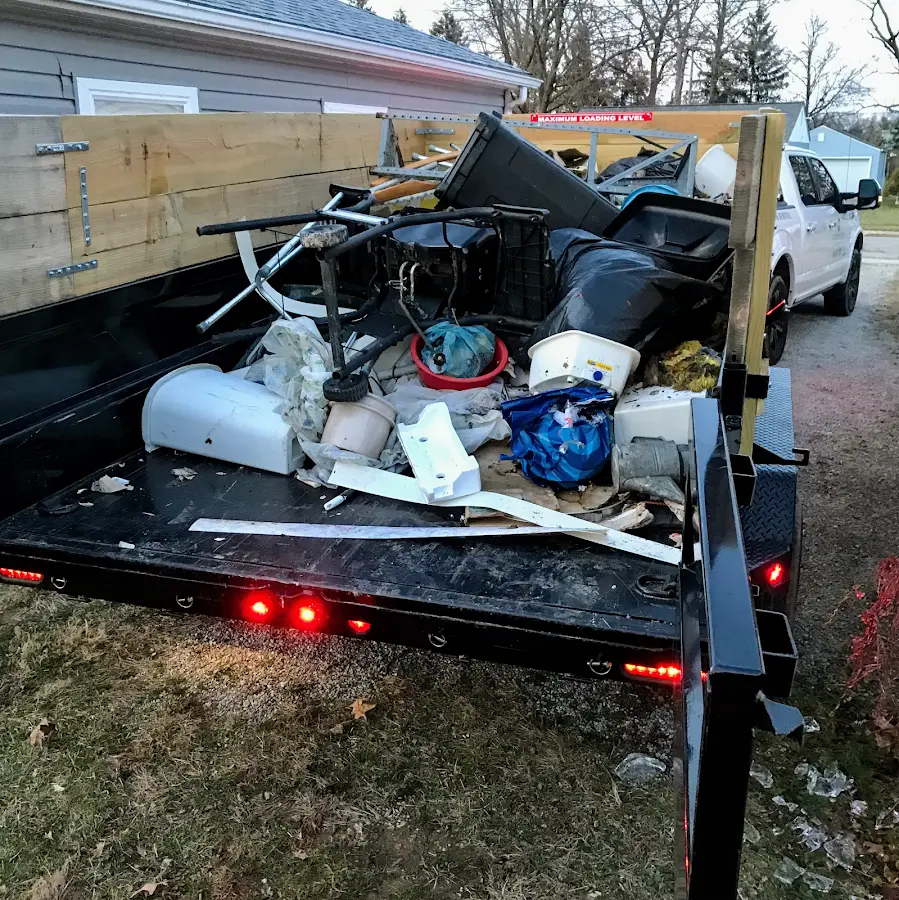 Roll-off dumpster delivered to a residential driveway in Battle Creek