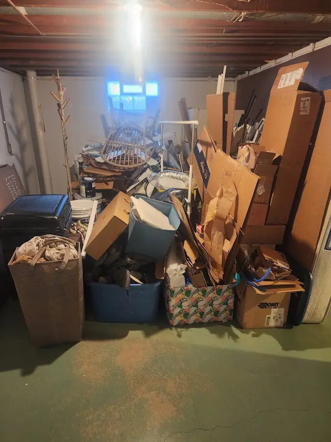 Roll-off dumpster container at job site for 4 Yard Dumpster Rental in Battle Creek